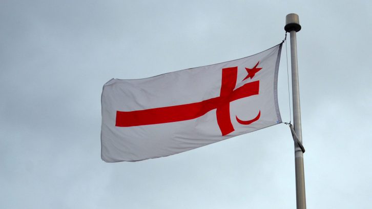 A Mi'kmaq flag flies over unceded and unsurrendered Mi'kmaq territory.