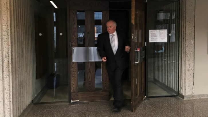Crown's latest witness, civilian RCMP employee Shaun MacEachern, leaves the courtroom after testifying on Thursday Feb. 7 in the drug trial against ex-Mountie Craig Robert Burnett.