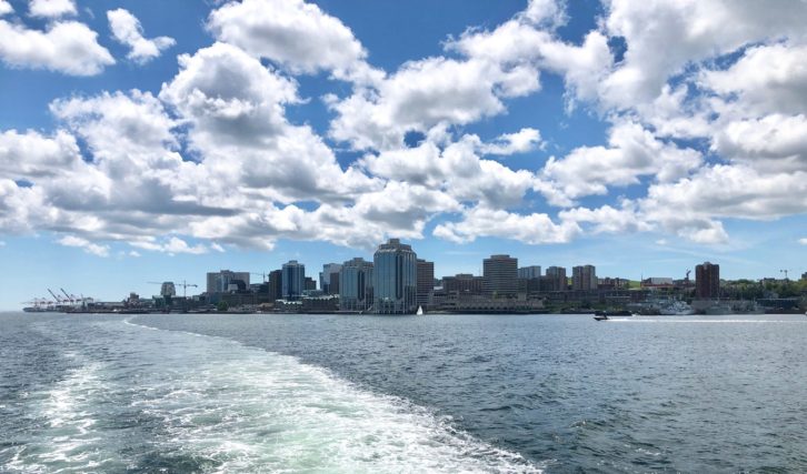 The Halifax skyline is viewed from a boat in the harbour on a sunny day. Statistics Canada estimates that Halifax’s population was at 460,274 people in 2021.