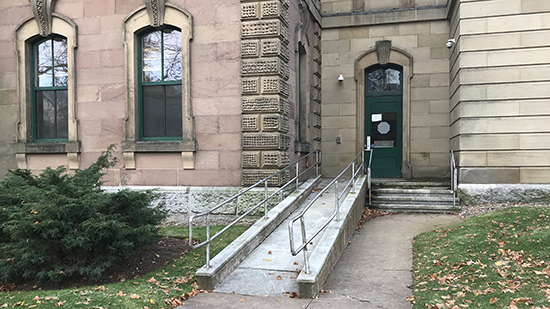 The separate ramp entrance to the courthouse. 