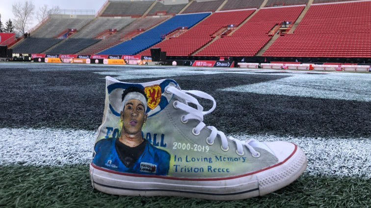 A portrait of Triston Reece was painted on a pair of Converse shoes by Kemmy Smith to be worn at the Grey Cup by Matthew Scianitti.