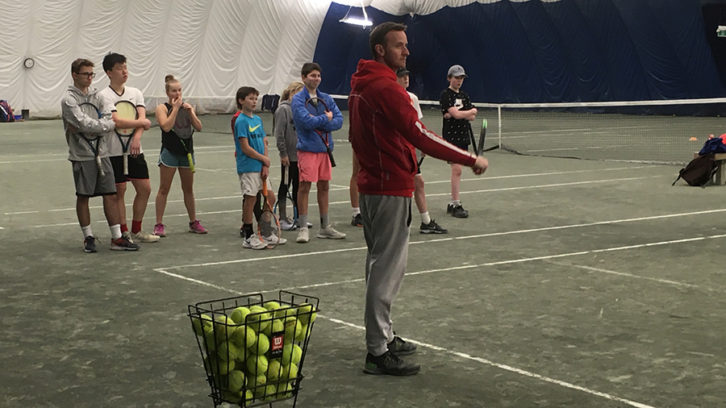 Gareth Dowdell instructs a group of junior players at the Atlantic Tennis Centre in Bedford Commons. The centre is set to expand in the spring from the original courts pictured here.