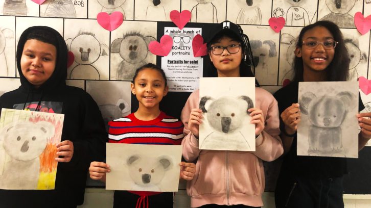 Kalen Burt, Paige Sampson, Mary Xu, Amarah Tupper holding their koala art