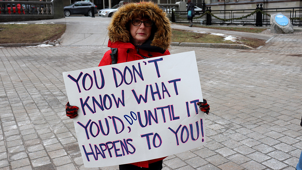 Cindy Moxsom demonstrated at Tuesday's rally about roadside memorials in HRM.
