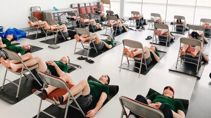 The Halifax Mooseheads do yoga to help with mental and physical relaxation before the playoffs in spring 2019.