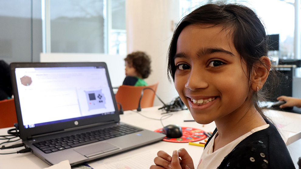 Kierra D’penha, 8, coded a message for astronauts at the Halifax Central Library on Tuesday.