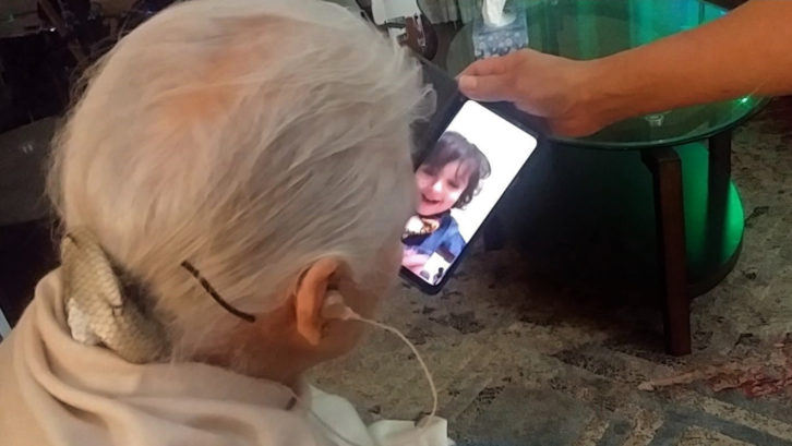 A Toronto-area senior video-chats with her grandson.