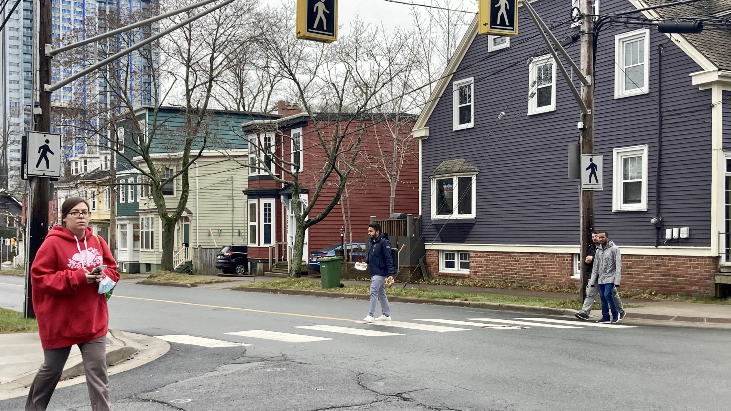 Pedestrians use a crosswalk on South Street in Halifax. 