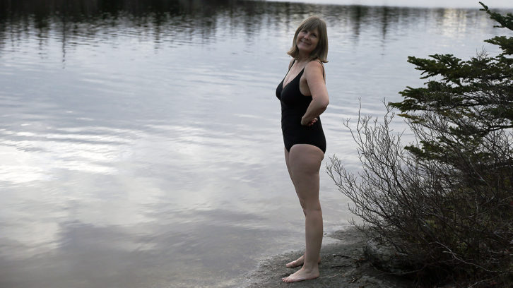 Kelly Loxdale poses before diving into Frederick Lake in Hubley, N.S., on Dec. 9.