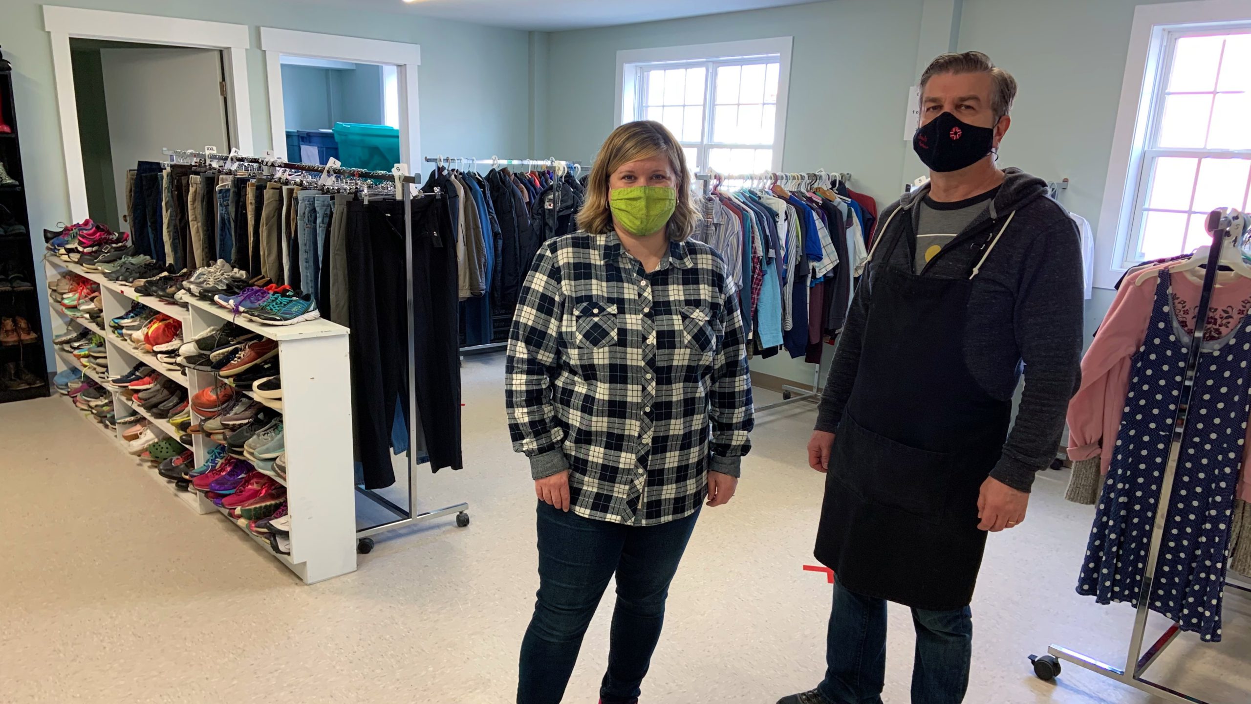 Lisa Jarvis and Will Radford with Souls Harbour Rescue Mission in the newly-reopened Basic Needs Room.