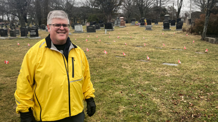 Steve St. Amant stands in the military section of the Fairview Cemetery in Halifax.