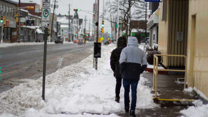 Winter storm brings heavy snow, causing power outages and closures in ...