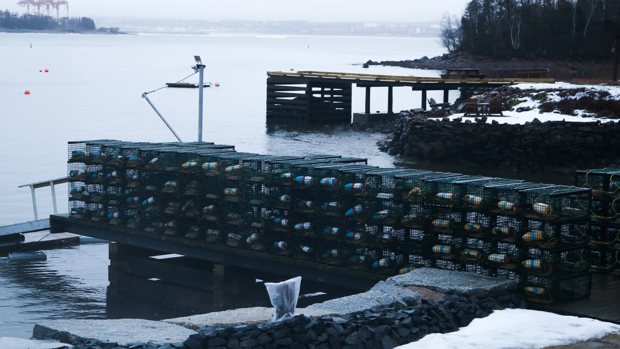 A stack of fishing traps organized on a dock in Purcell's Cove. 