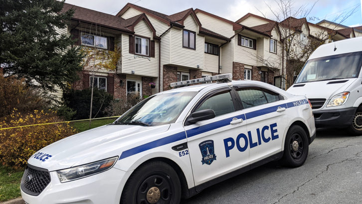 A police car sits outside of a residence on Braeside Court, Dartmouth, Sunday where a man accused in a high-profile sexual assault case was found dead.