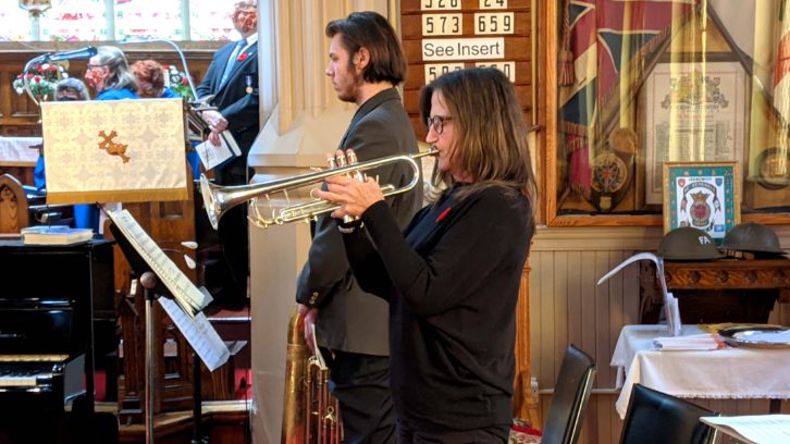 Sue Mantin playing the Last Post at a Remembrance Day service in St. Mark's Anglican Church on Sunday. She has performed at their services for years.