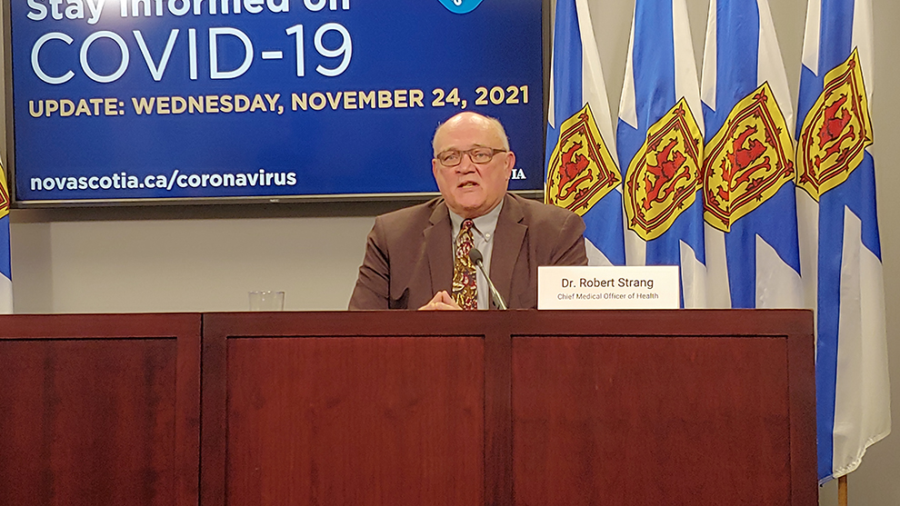 Dr. Robert Strang takes questions at a COVID briefing in November.