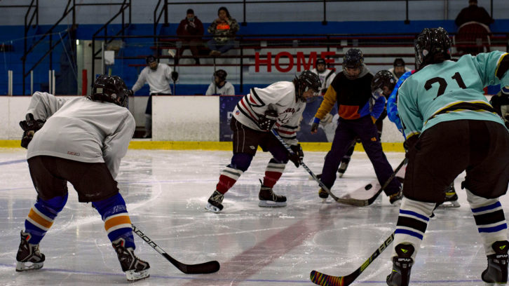 Face off: players wait for the puck to drop at Halifax's queer-only hockey game on Saturday.
