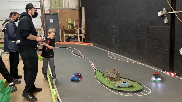 Shane Inness and his son at East Coast Indoor RC Park on Nov. 14, 2021.