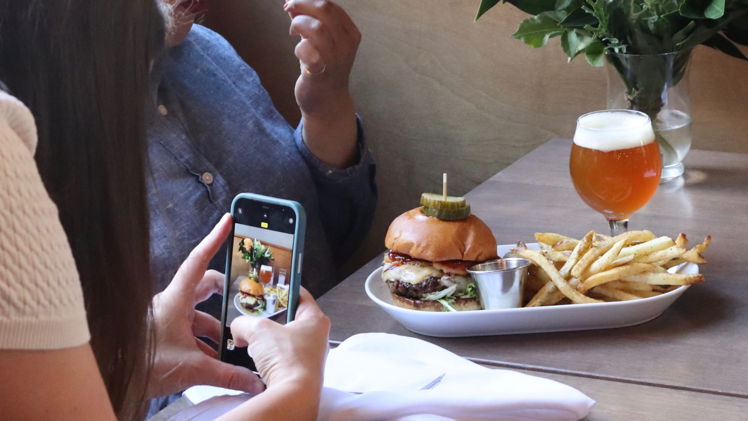 Shannon MacIntyre took photos and videos to promote Julep Restaurant’s burger for Halifax Burger Week. The restaurant hired MacIntyre to make content for Instagram. 