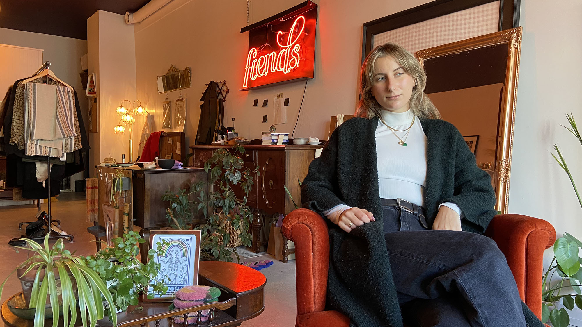 Forest Greenwell sits in her store, Fiends, in downtown Dartmouth.