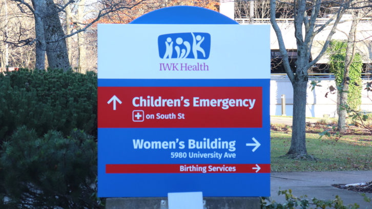 A sign at the IWK Health Centre in Halifax points to the direction of birthing services at the hospital.