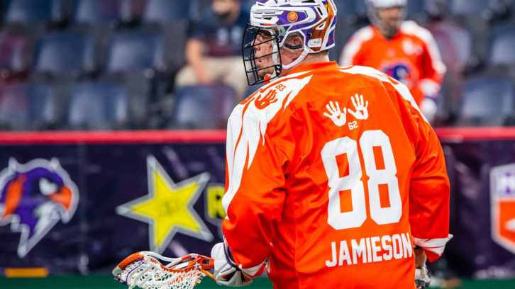 Cody Jamieson warms up in his Every Child Matters jersey with his grandmother's handprints above his number before the team's home opener on Dec. 4.
