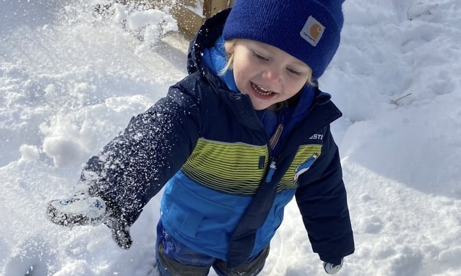 A student at Bright Side Early Learning Centre in Cole Harbour plays outdoors in the snow.  The province has agreed to give private daycare owners more time to consider their options on a new funding agreement.