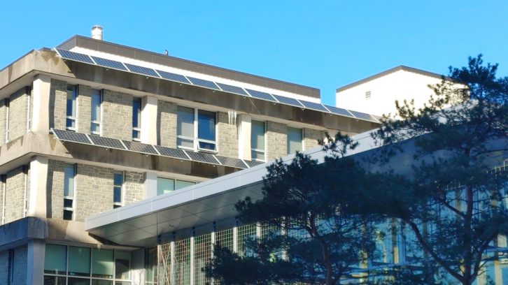 A Dalhousie University building on University Avenue in Halifax sports solar panels on its side.