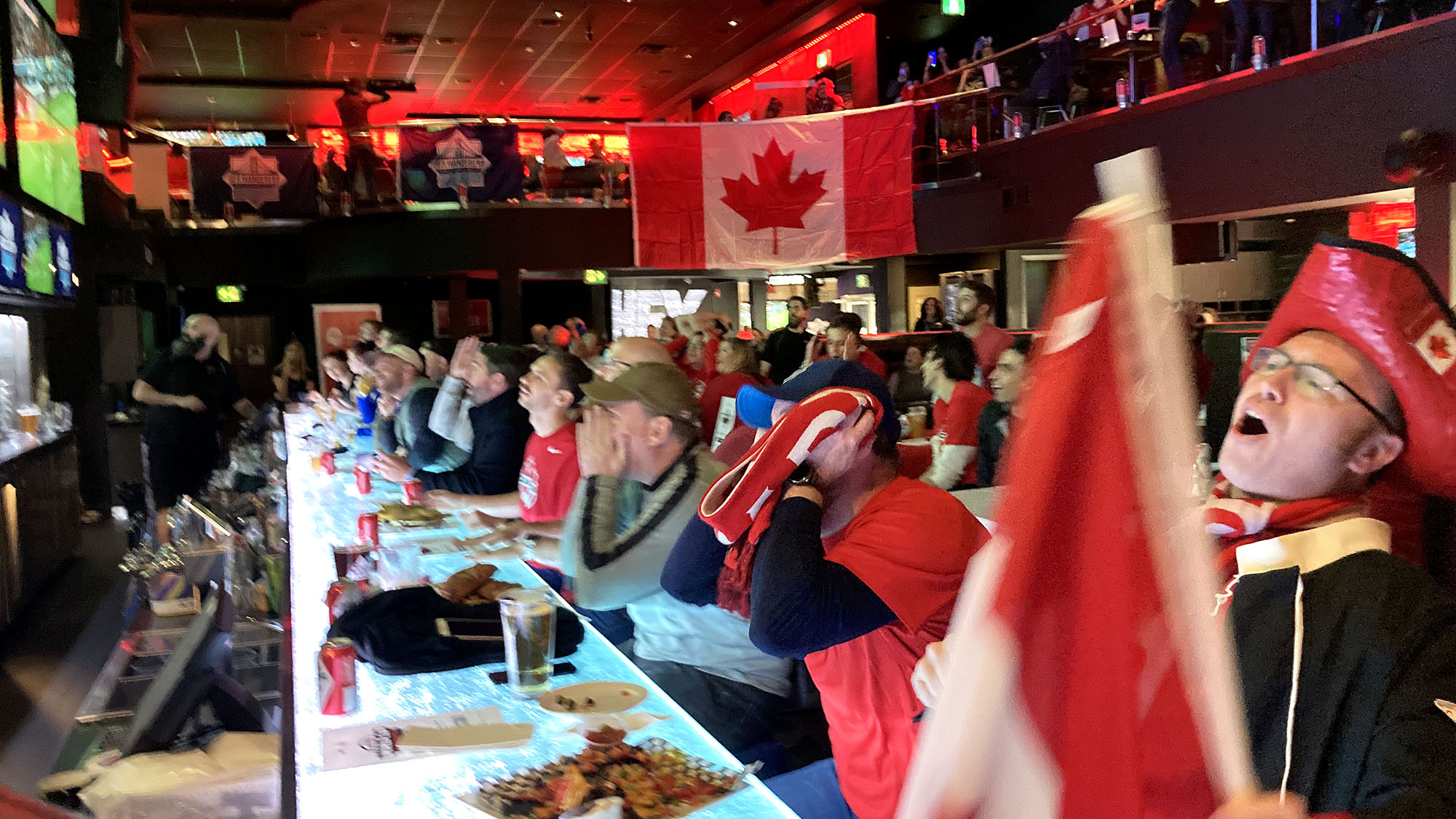 Denton Froese, right, gasps as Canada missed a penalty kick in its FIFA World Cup match versus Belgium on Wednesday. At HFX Sports Bar & Grill, more than 100 people took in Canada's first World Cup game in 36 years.