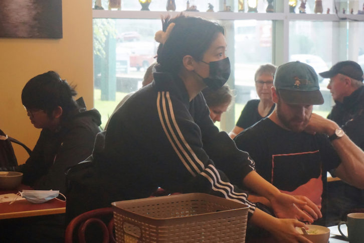 Xuan Lu is working at Jacky's Cafe in Halifax as a server.