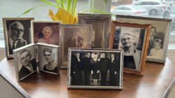 Photos of Ella Roberts' family members sit on a table in her living her room