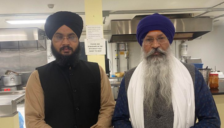 From left to right volunteer Lakhvinder Singh and priest Mandeep Singh at the Maritime Sikh Society in Halifax.