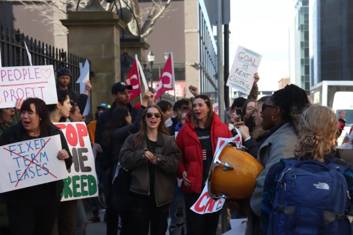 Young people protest the high living wages in Halifax.