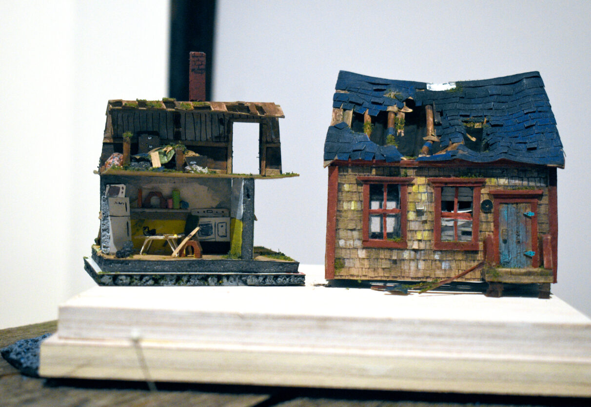 A miniature house made by artist John Eaton on display