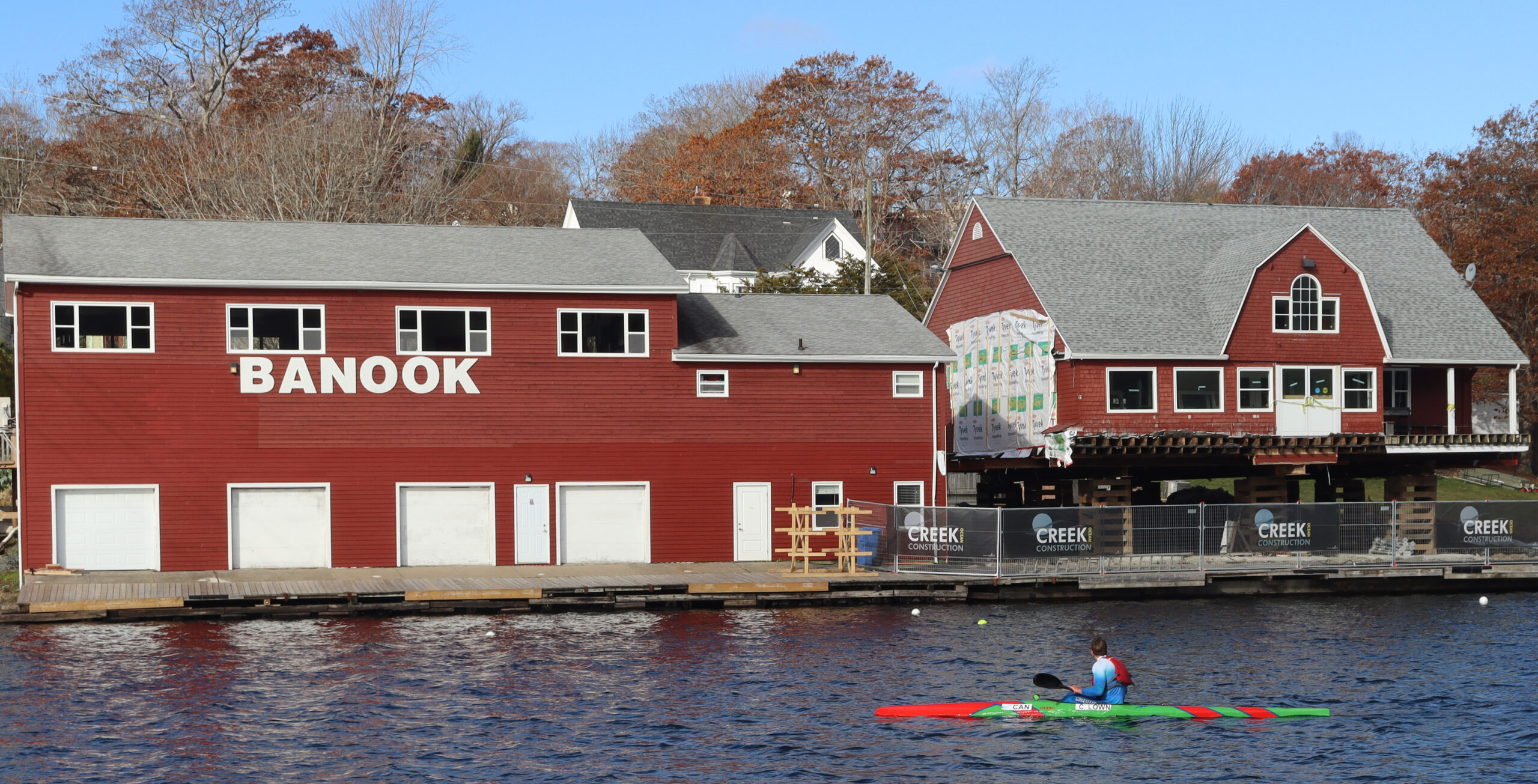 A man paddling near the Banook Canoe Club building on Wednesday.