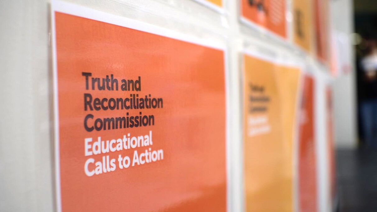 Posters on wall displaying some of the “Calls to Action” brought forth by Canada’s Truth and Reconciliation Commission.