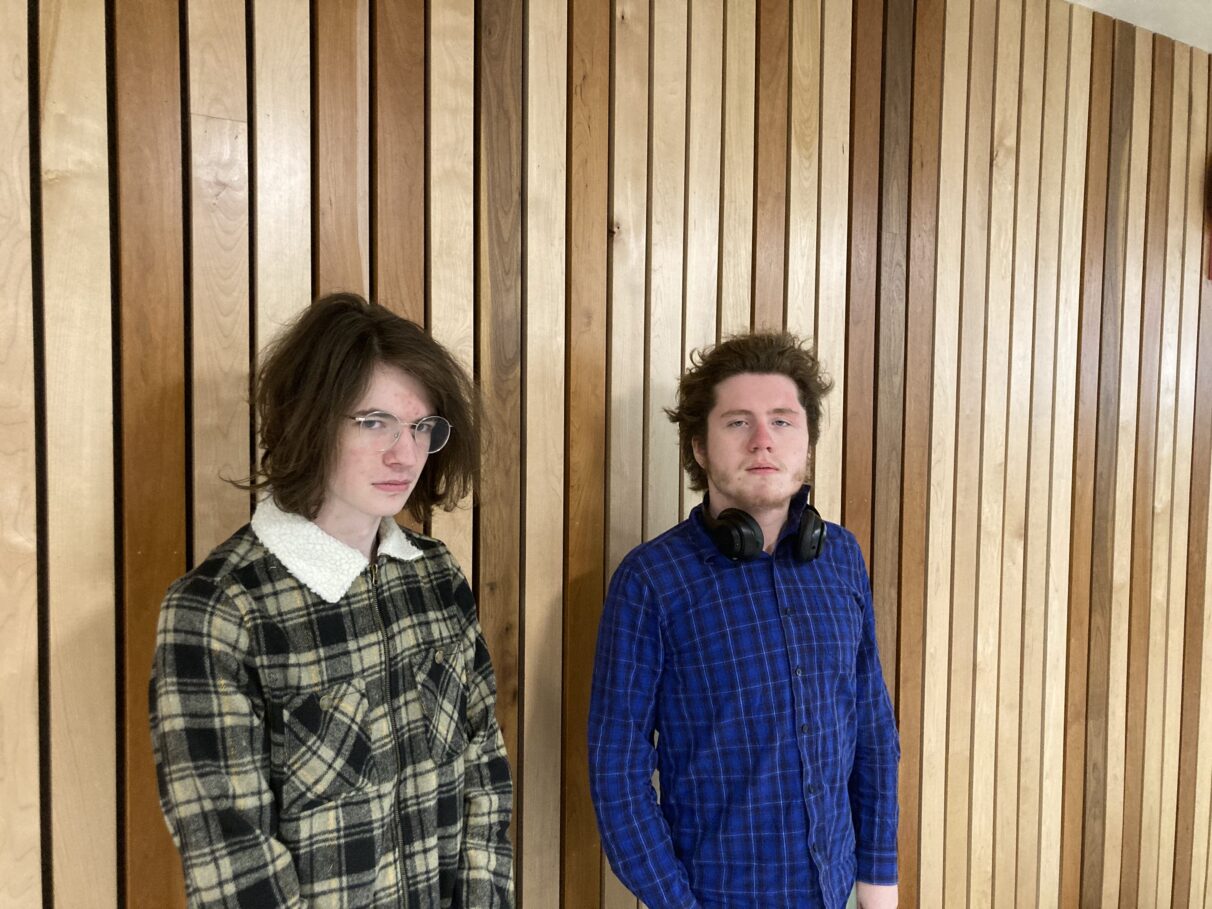 Nate Mahoney (left) and Alfonso Abraham pose for a photo in the Dalhousie Student Union Building.