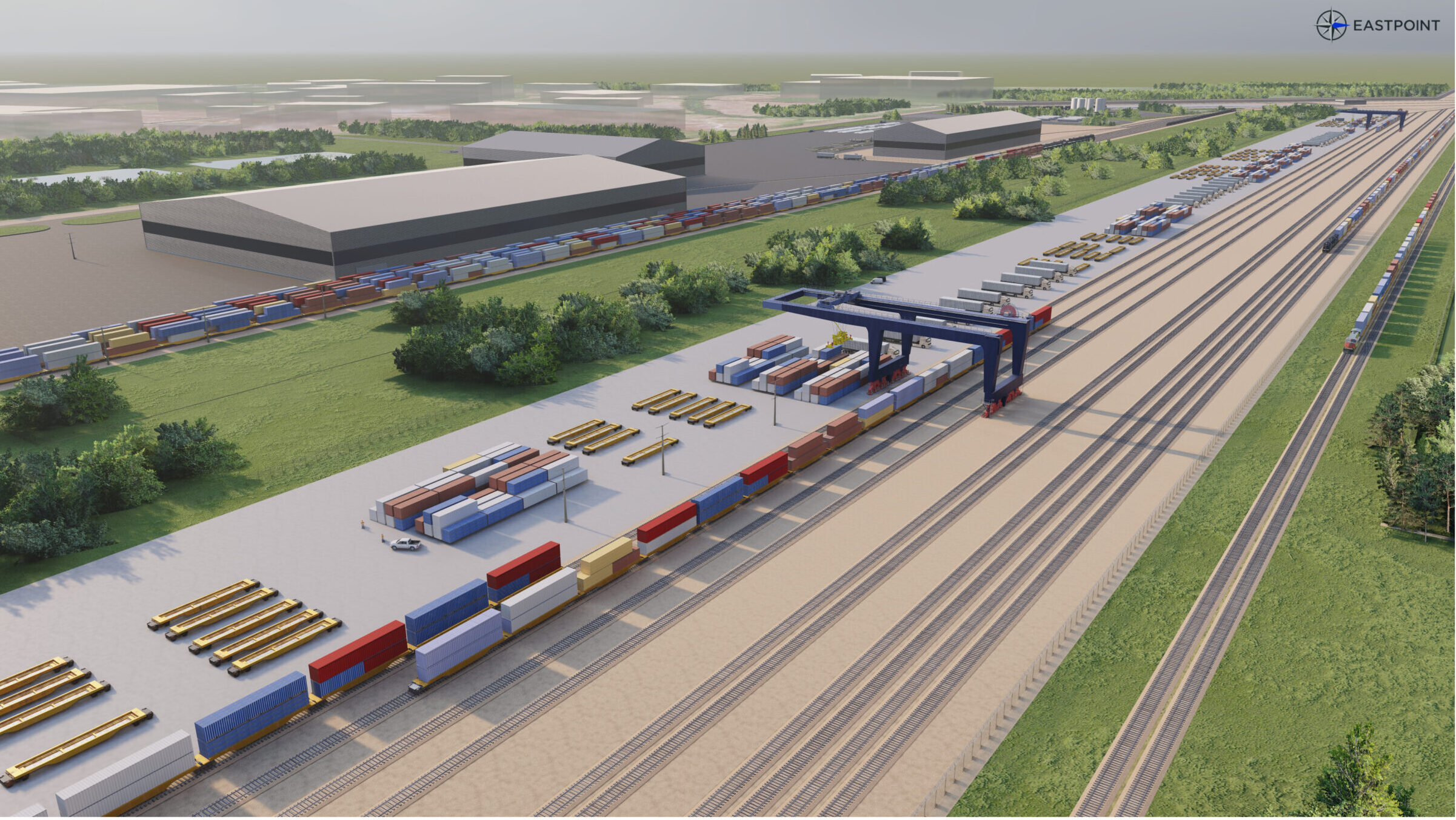 A digital rendering of a large inland rail terminal featuring rail tracks, boxcars, warehouses, and large parking lots within a green vista.