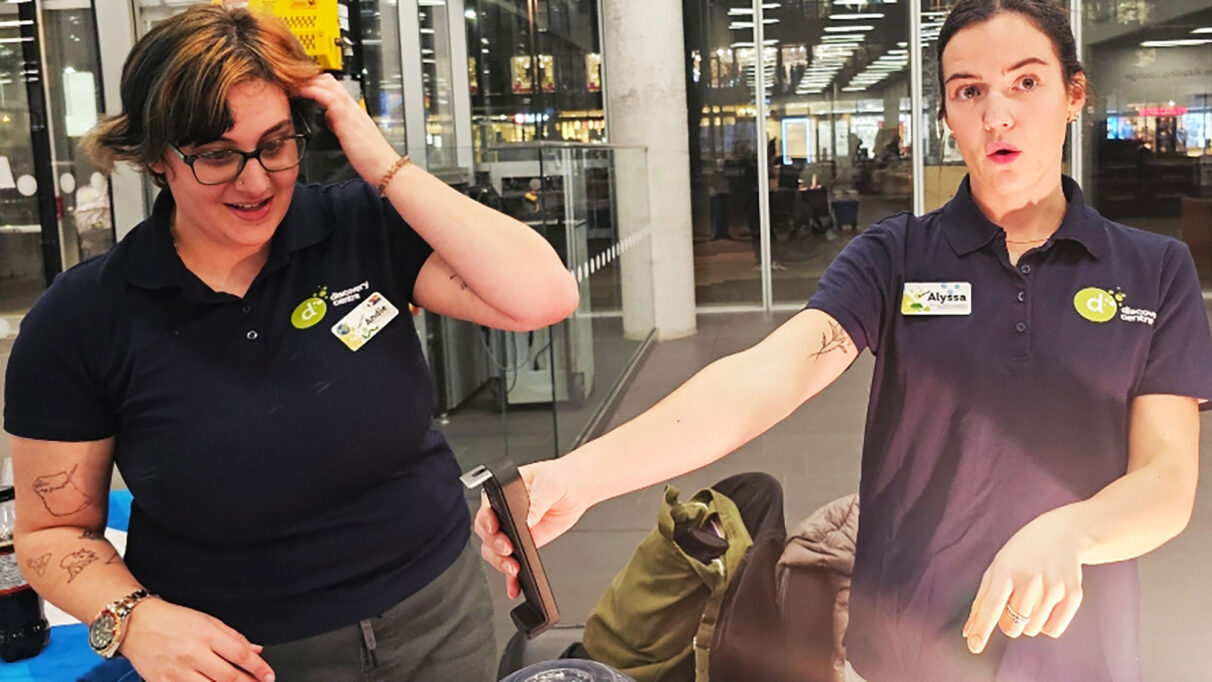 Two women demonstrating climate change.