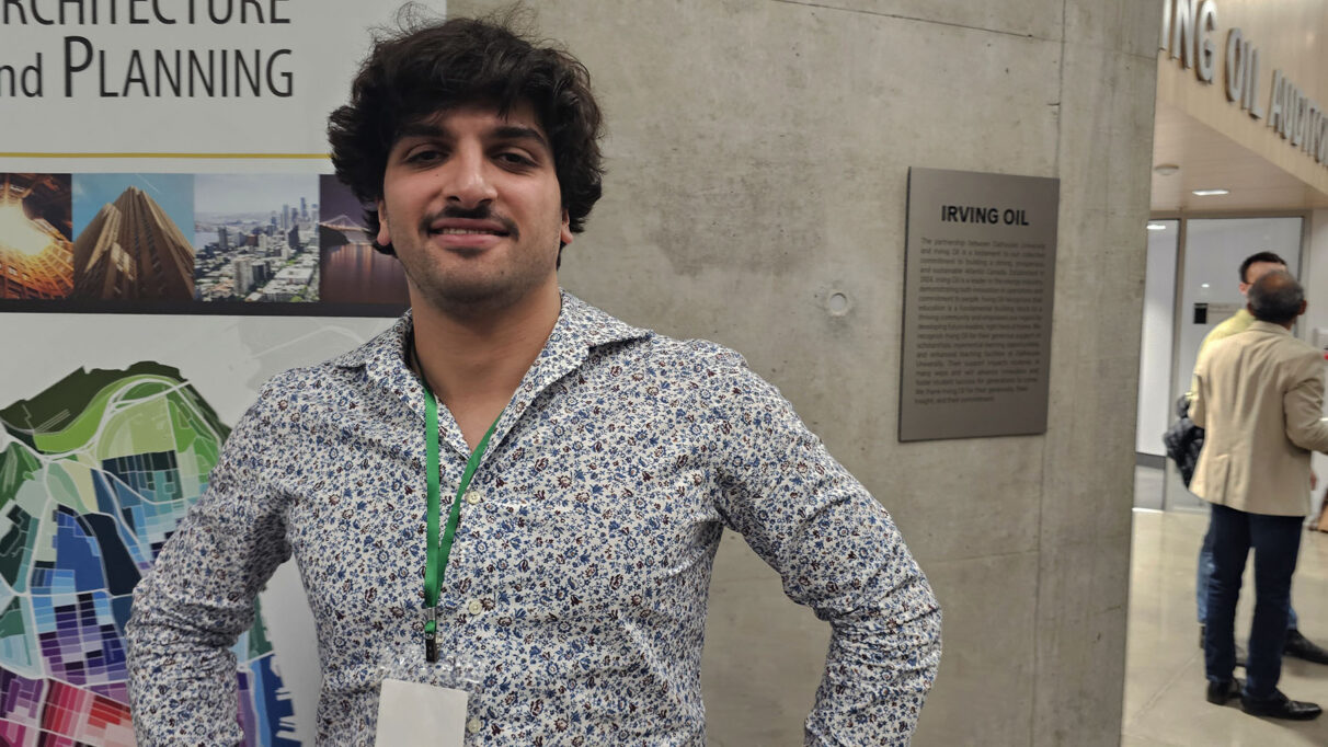 A young man, Layth Abou Ezzeddine, smiling into the camera.