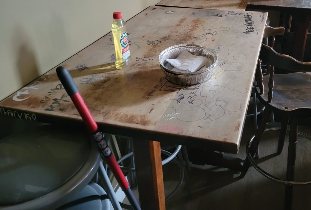 a graffiti-covered table