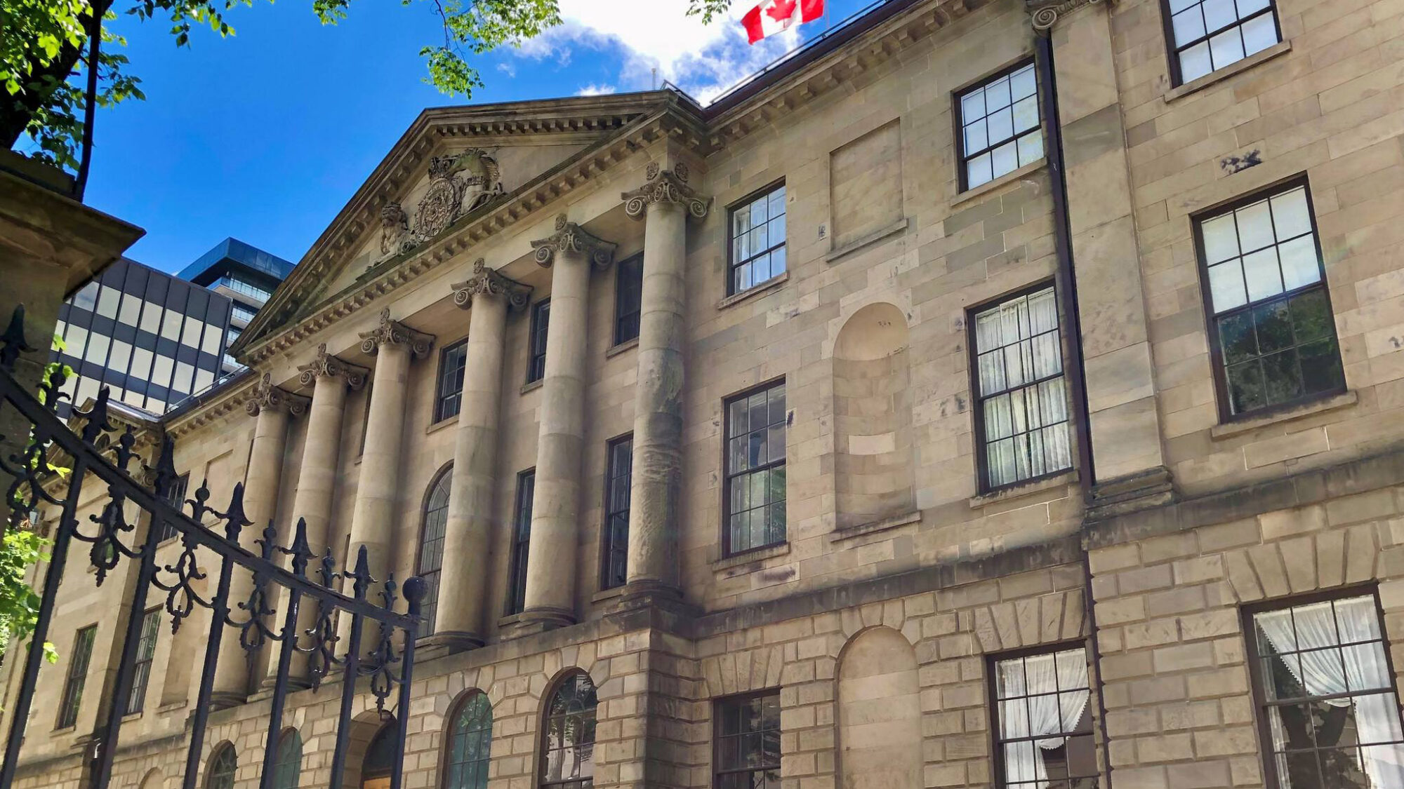 Stone covered building with columns