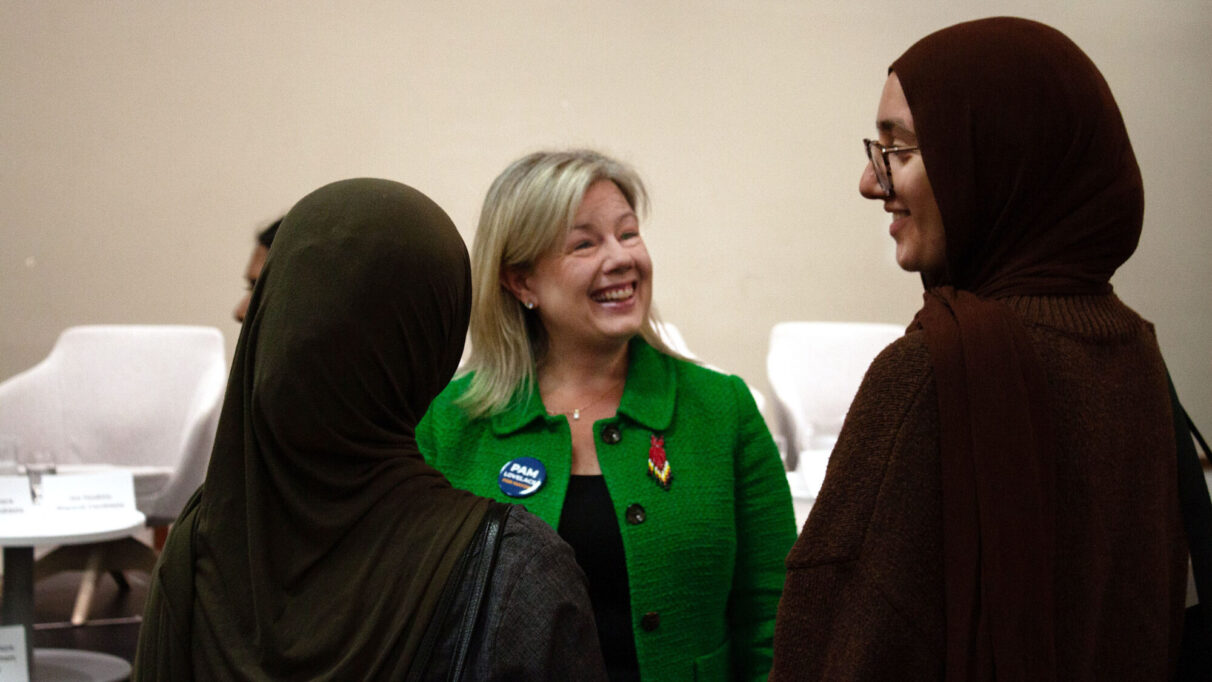 Lovelace speaks to two women after a candidate’s debate at Saint Mary’s University in the South End of Halifax, on 10 Oct. 2024. Five of the 16 candidates were invited to this debate.