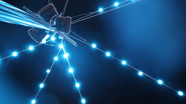 Blue lights extending from a central poll.