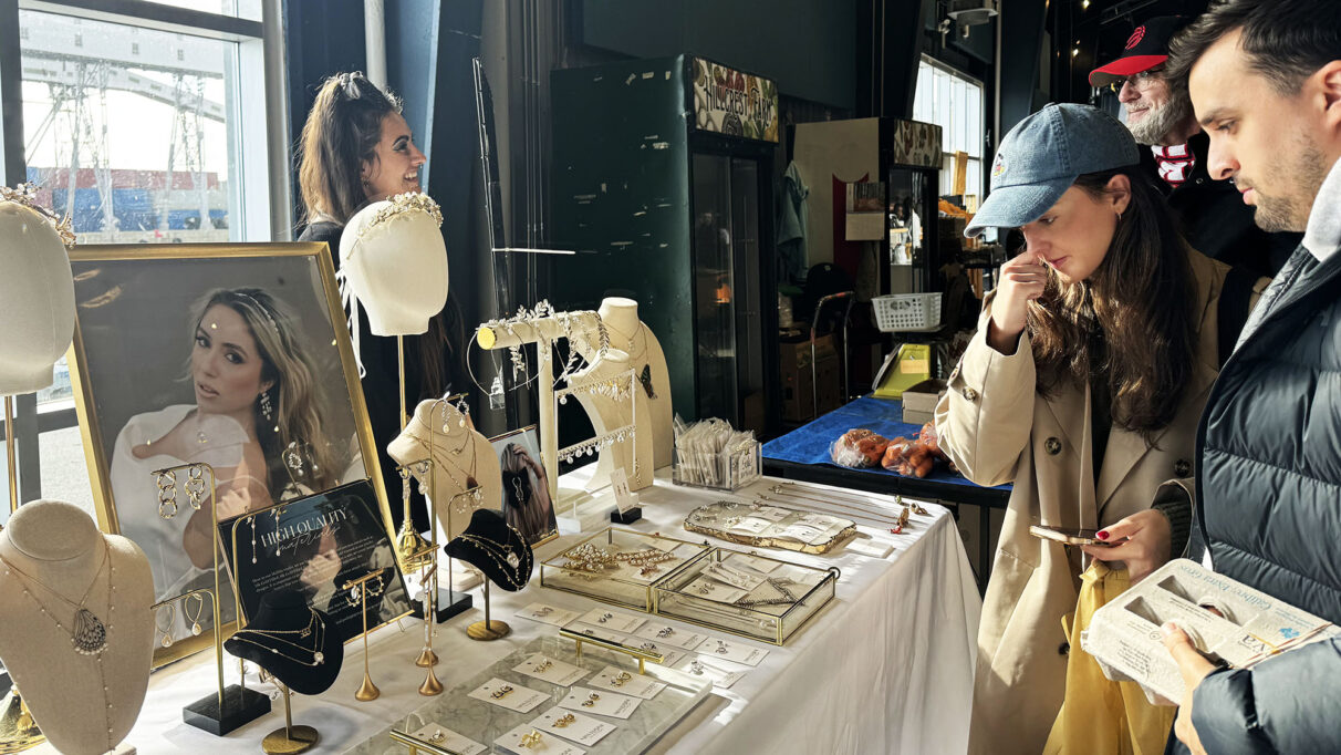 A group of people at a jewelry stand