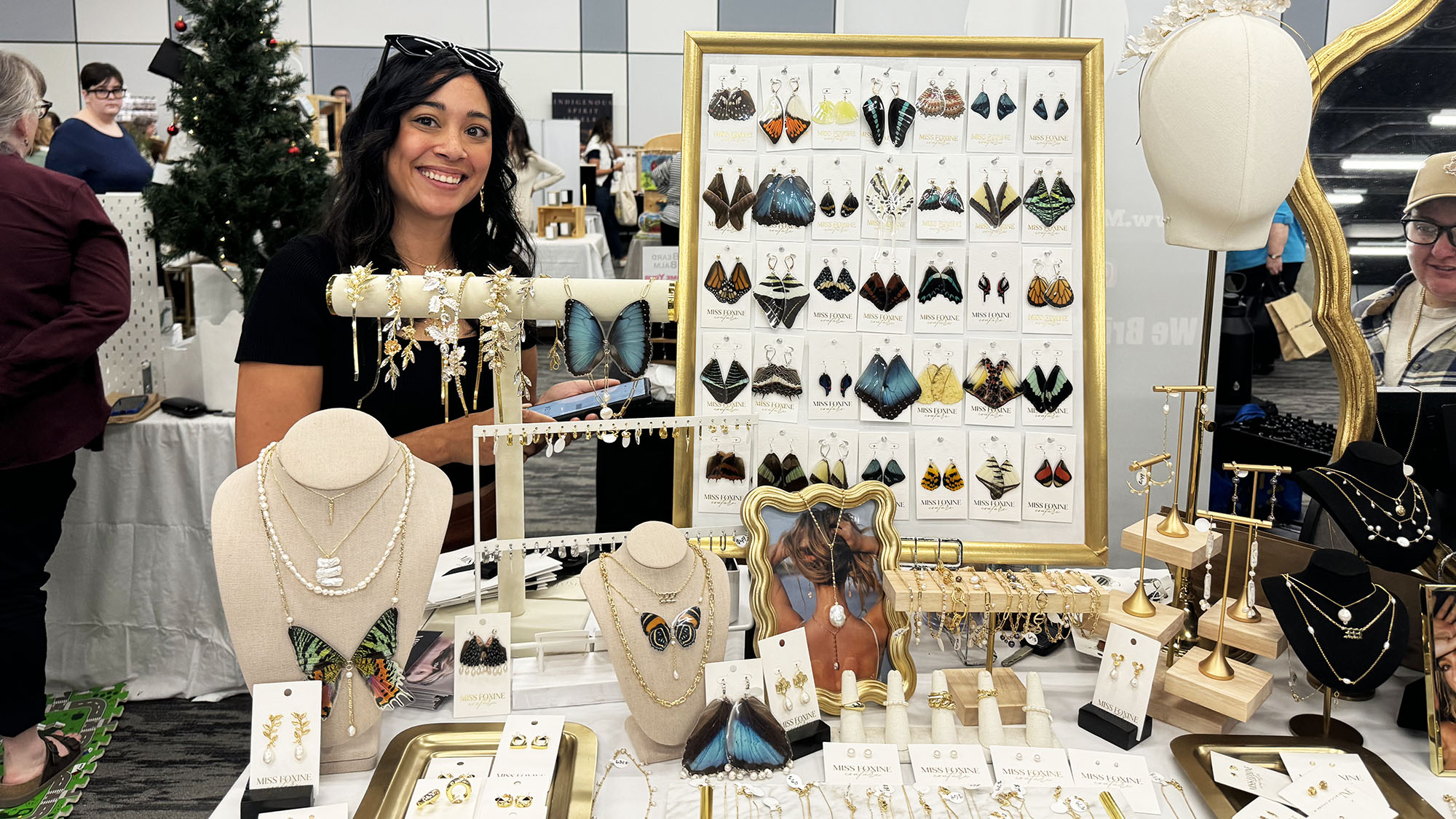 A woman displaying jewelries.