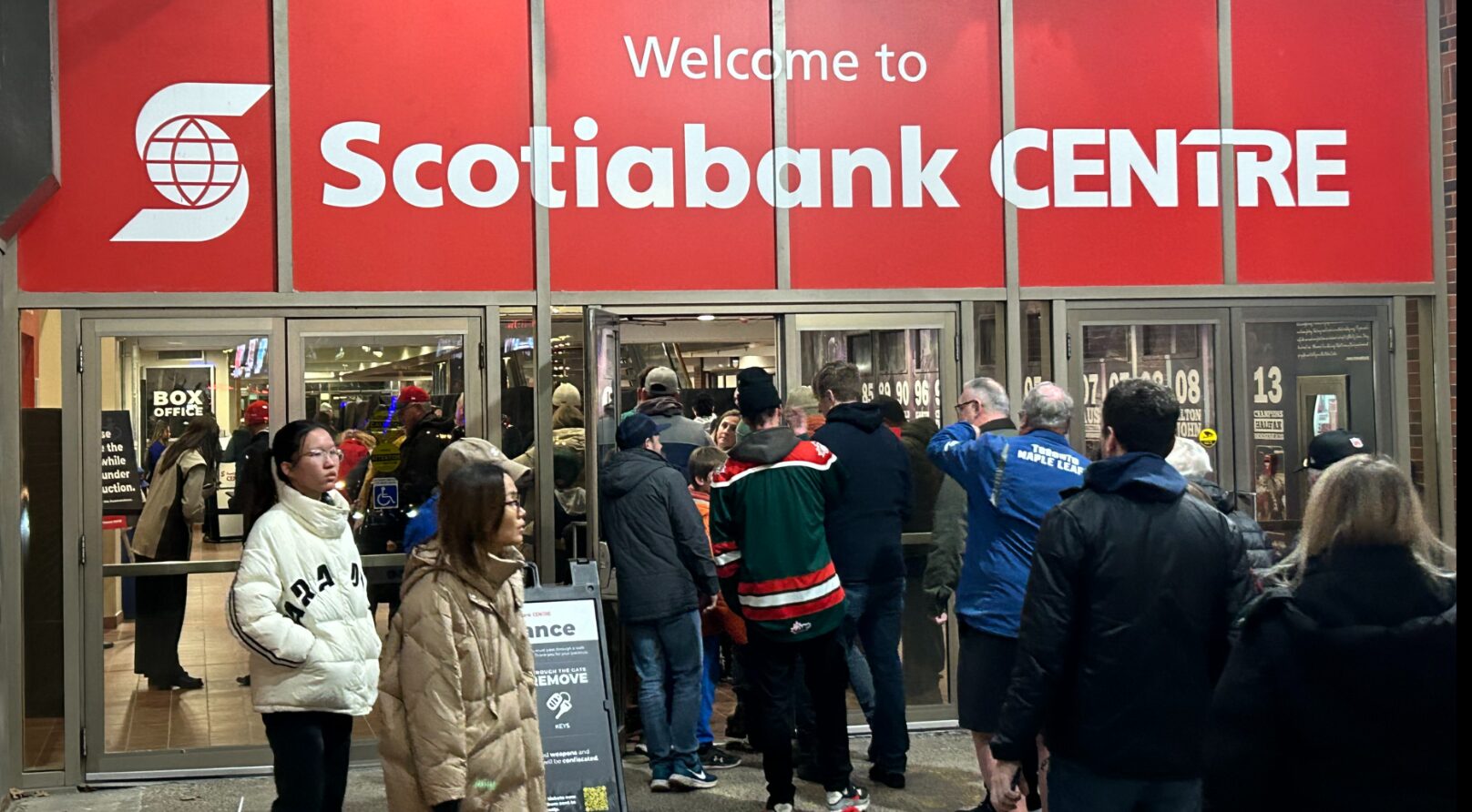 A line of fans wait outside to get into the Scotiabank Centre