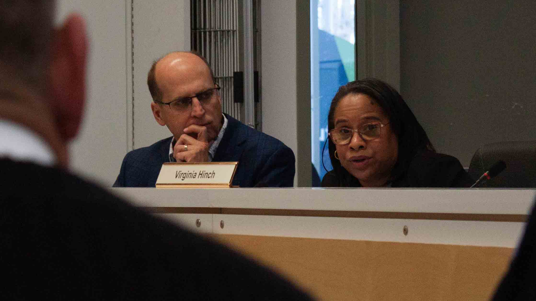 Greg O'Malley and Virginia Hinch at the board of police commissioners meeting.