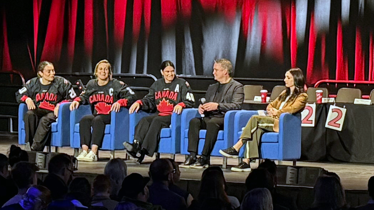 Members of Team Canada and host Kenzie Lalonde sit on stage at the Light House Arts Centre for a panel discussion.