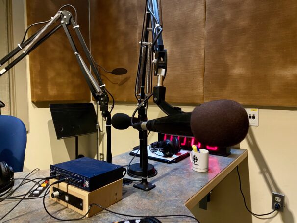 A close up of a microphone in a recording room